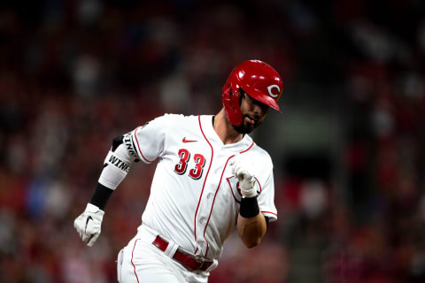 Cincinnati Reds right fielder Jesse Winker (33) rounds third base after hitting a 2-run home run.