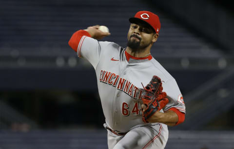 Cincinnati Reds relief pitcher Tony Santillan (64).