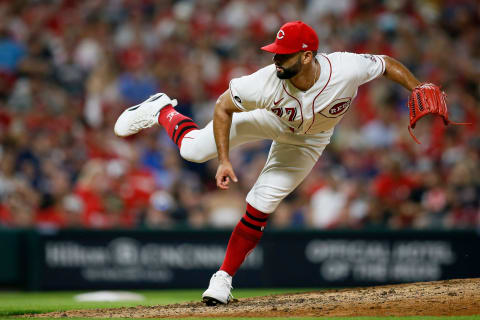 Cincinnati Reds relief pitcher Art Warren (77) follows through on a pitch.