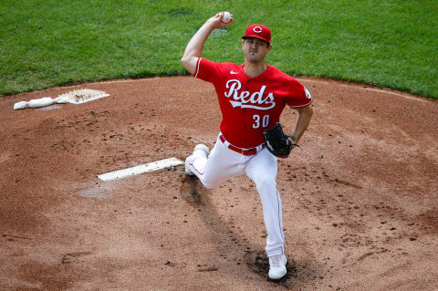 Cincinnati Reds starting pitcher Tyler Mahle (30) delivers the ball.