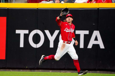 Cincinnati Reds center fielder TJ Friedl (29) catches a fly ball.