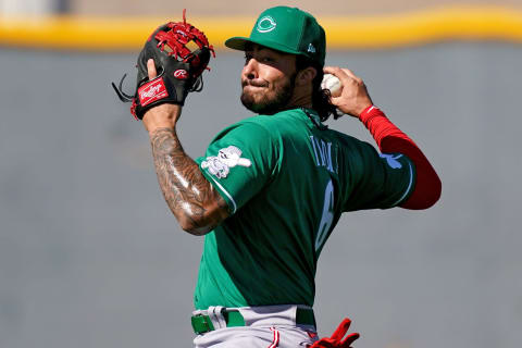 Cincinnati Reds infielder Jonathan India (6) throws during relay drills.