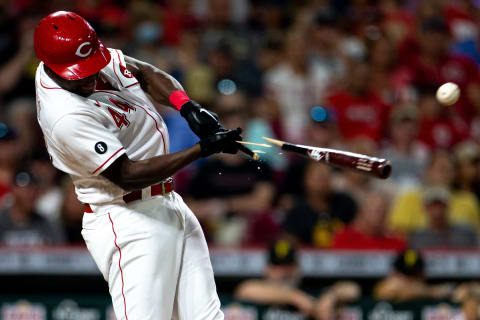 Cincinnati Reds left fielder Aristides Aquino (44) hits a double.