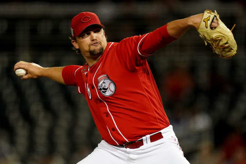 Cincinnati Reds non-roster invitee pitcher Zack Godley (48) delivers during a spring training game.