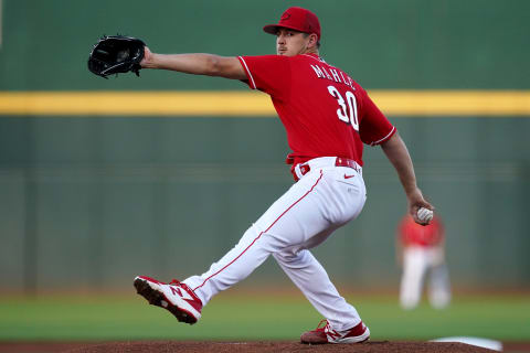 Cincinnati Reds pitcher Tyler Mahle (30) delivers during a spring training game.