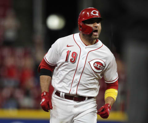 Cincinnati Reds first baseman Joey Votto (19) reacts as he runs the bases.