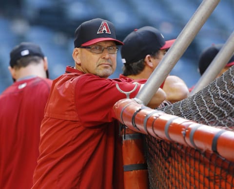 Diamondbacks assistant hitting coach Mark Grace looks on before a game against the Texas Rangers on