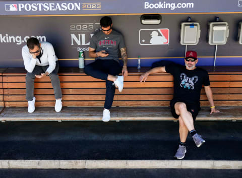 Assistant general manager Amiel Sawdaye, general manager Mike Hazen, and manager Torey Lovullo