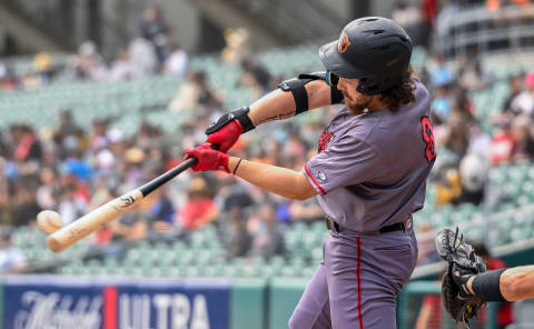 Visalia Rawhide's David Martin bats against Fresno Grizzlies on Tuesday, May 9, 2023.