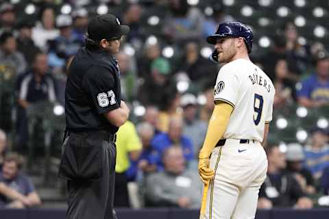 oApr 29, 2024; Milwaukee, Wisconsin, USA;  Milwaukee Brewers first baseman Jake Bauers (9) argues