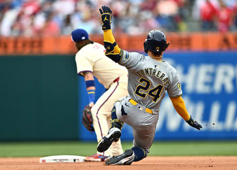 Jun 5, 2024; Philadelphia, Pennsylvania, USA; Milwaukee Brewers catcher William Contreras (24) slides into second base after hitting a double against the Philadelphia Phillies in the seventh inning at Citizens Bank Park. Mandatory Credit: Kyle Ross-USA TODAY Sports