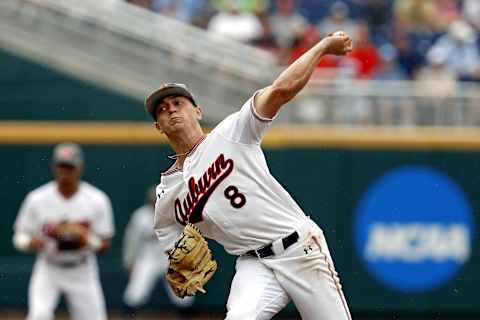 Jun 18, 2019; Omaha, NE, USA; Auburn Tigers pitcher Bailey Horn (8) throws in the first inning