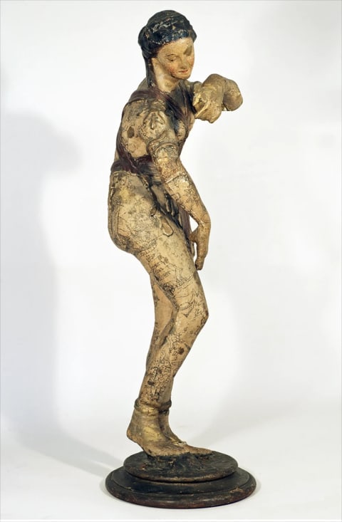 STATUE FROM CHARLIE WAGNER’S TATTOO SHOP AT 11 CHATHAM SQUARE, CA. 1930, POLYCHROMED PAPIER-MÂCHÉ AND LINEN ON WOOD TURNED BASE, COLLECTION OF ADAM WO