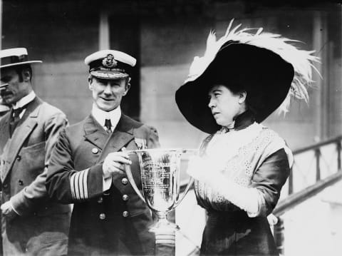 Brown presenting Captain Arthur Henry Rostron with a silver cup. 