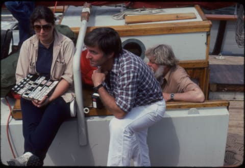 Director and cameraman D’Arcy Marsh (center) and Peter Marston, the owner/captain of the 'Mimi' who also played Captain Granville, between takes.