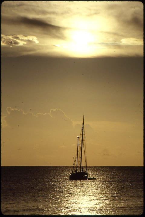 The 'Mimi' sailing at sunset.