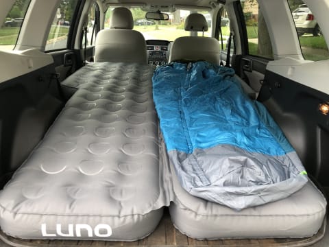 Unrolled sleeping bag to show scale