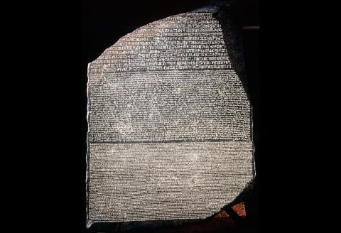 The Rosetta Stone, a basalt slab inscribed with a decree of the pharaoh Ptolemy V in three languages.