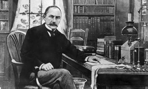 An illustration of Thomas Hardy in his study