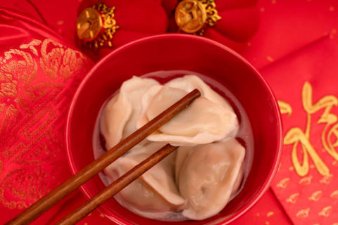 Want to invite more luck into your life in the new year? Try nibbling on some dumplings. 