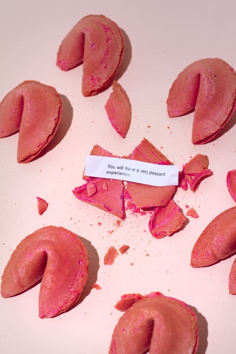 A handful of strawberry-flavored fortune cookies.