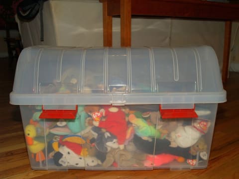 Beanie Babies collection stored in plastic bin.