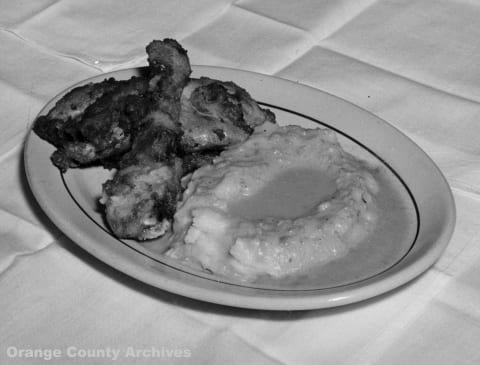 A meal at Mrs. Knott’s Chicken Dinner Restaurant, circa 1940.