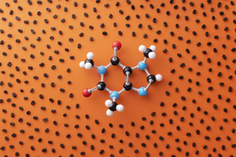 The caffeine molecule surrounded by coffee beans.