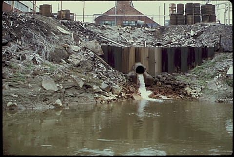 The Harshaw Chemical Company discharges waste directly into the Cuyahoga River in May 1973.