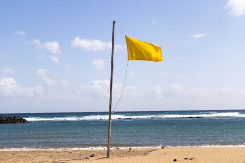 A yellow flag in the Canary Islands.