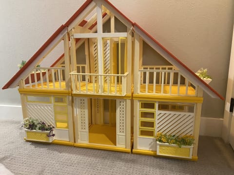 The 1978 Barbie Dream House features a unique A-frame roof, which sets it apart. 