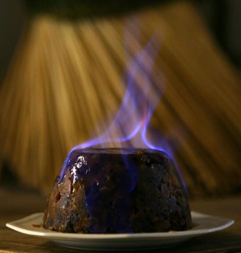 A Christmas pudding en flambé.