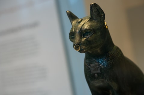 Ancient Egyptian cat statue housed at the British Museum.