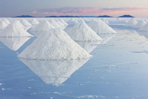 Salt being harvested from Salar de Uyuni in Bolivia.