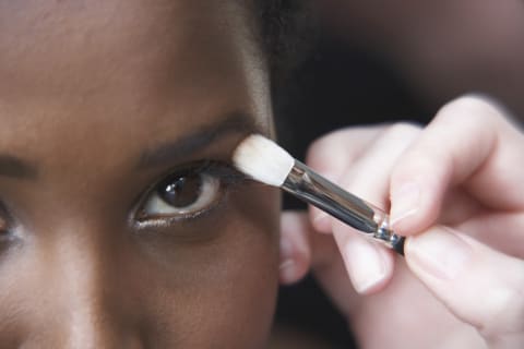 A woman with brown irises.