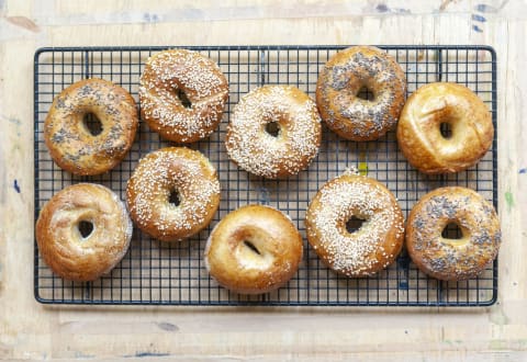 Bagels cooling on a rack.