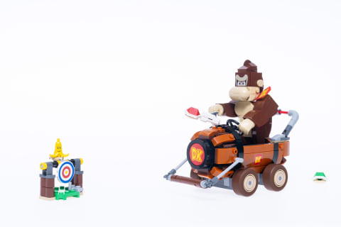 Donkey Kong comes in his famous barrel cart.