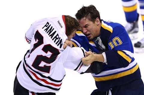 Nov 9, 2016; St. Louis, MO, USA; Chicago Blackhawks left wing Artemi Panarin (72) and St. Louis Blues right wing Scottie Upshall (10) brawl during the third period at Scottrade Center. The Blackhawks won 2-1 in overtime. Mandatory Credit: Billy Hurst-USA TODAY Sports