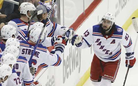 May 13, 2022; Pittsburgh, Pennsylvania, USA; New York Rangers center Mika Zibanejad (93) celebrates his second goal of the game with the Rangers bench against the Pittsburgh Penguins during the second period in game six of the first round of the 2022 Stanley Cup Playoffs at PPG Paints Arena. Mandatory Credit: Charles LeClaire-USA TODAY Sports