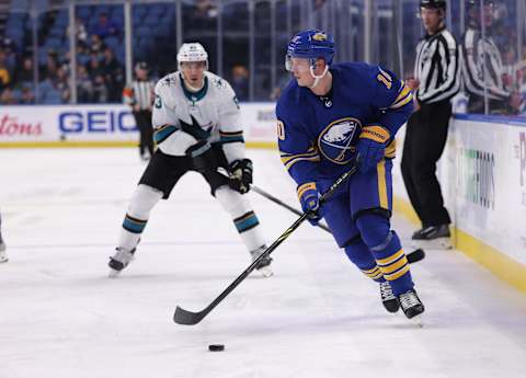 Jan 6, 2022; Buffalo, New York, USA; Buffalo Sabres defenseman Henri Jokiharju (10) looks to make a pass during the third period against the San Jose Sharks at KeyBank Center. Mandatory Credit: Timothy T. Ludwig-USA TODAY Sports