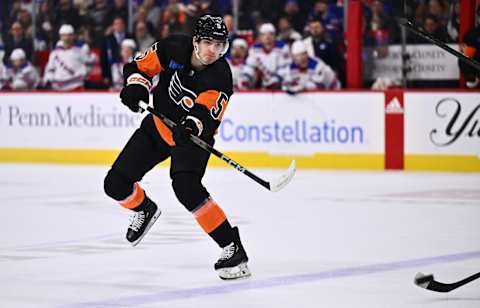 Nov 24, 2023; Philadelphia, Pennsylvania, USA; Philadelphia Flyers defenseman Egor Zamula (5) passes the puck against the New York Rangers in the second period at Wells Fargo Center. Mandatory Credit: Kyle Ross-USA TODAY Sports