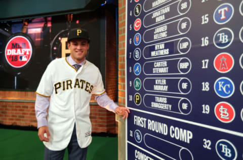 SECAUCUS, NJ – JUNE 4: Travis Swaggerty who was selected 10th overall by the Pittsburgh Pirates poses for a photo by the draft board during the 2018 Major League Baseball Draft at Studio 42 at the MLB Network on Monday, June 4, 2018 in Secaucus, New Jersey. (Photo by Alex Trautwig/MLB Photos via Getty Images)