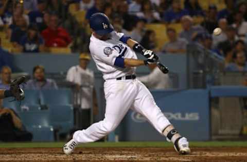 LOS ANGELES, CA – AUGUST 01:Brian Dozier #6 of the Los Angeles Dodgers hits a solo homerun during the fifth inning of the MLB game against the Milwaukee Brewers at Dodger Stadium on August 1, 2018 in Los Angeles, California. (Photo by Victor Decolongon/Getty Images)