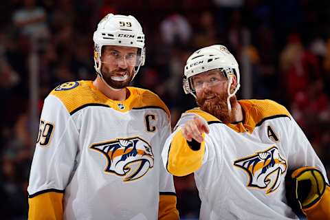 SUNRISE, FL – NOVEMBER 30: Ryan Ellis #4 of the Nashville Predators chats with teammate Roman Josi #59 during a break in the action against the Florida Panthers at the BB&T Center on November 30, 2019 in Sunrise, Florida. (Photo by Eliot J. Schechter/NHLI via Getty Images)