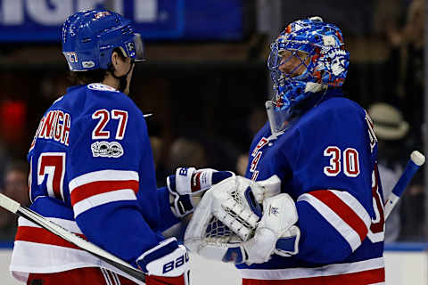 Feb 19, 2017; New York, NY, USA; New York Rangers goalie Henrik Lundqvist (30) celebrates with Rangers defenseman Ryan McDonagh (27) after defeating the Washington Capitals at Madison Square Garden. Mandatory Credit: Adam Hunger-USA TODAY Sports