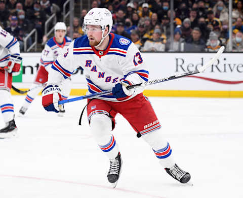 Nov 26, 2021; Boston, Massachusetts, USA; New York Rangers left wing Alexis Lafreniere (13) follows the play during the third period against the Boston Bruins at TD Garden. Mandatory Credit: Bob DeChiara-USA TODAY Sports