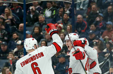 COLUMBUS, OH – JANUARY 16: Martin Necas #88 of the Carolina Hurricanes is congratulated by Joel Edmundson #6 after scoring a goal during the second period against the Columbus Blue Jackets on January 16, 2020 at Nationwide Arena in Columbus, Ohio. (Photo by Kirk Irwin/Getty Images)