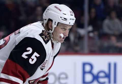 Oct 20, 2016; Montreal, Quebec, CAN; Arizona Coyotes forward ryan White (25) prepares for a faceoff against the Montreal Canadiens during the second period at the Bell Centre. Mandatory Credit: Eric Bolte-USA TODAY Sports