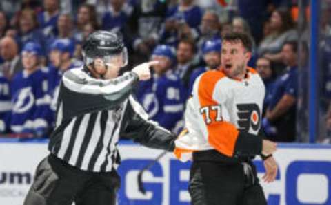 Mar 7, 2023; Tampa, Florida, USA; Philadelphia Flyers defenseman Tony DeAngelo (77) reacts after a penalty during a game against the Tampa Bay Lightning in the third period at Amalie Arena. Mandatory Credit: Nathan Ray Seebeck-USA TODAY Sports