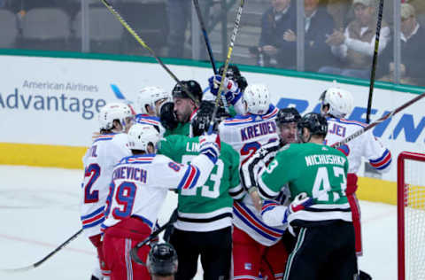 DALLAS, TEXAS – MARCH 05: Roman Polak #45 of the Dallas Stars and Esa Lindell #23 of the Dallas Stars fight against Filip Chytil #72 of the New York Rangers, Pavel Buchnevich #89 of the New York Rangers and Chris Kreider #20 of the New York Rangers in the third period at American Airlines Center on March 05, 2019 in Dallas, Texas. (Photo by Tom Pennington/Getty Images)